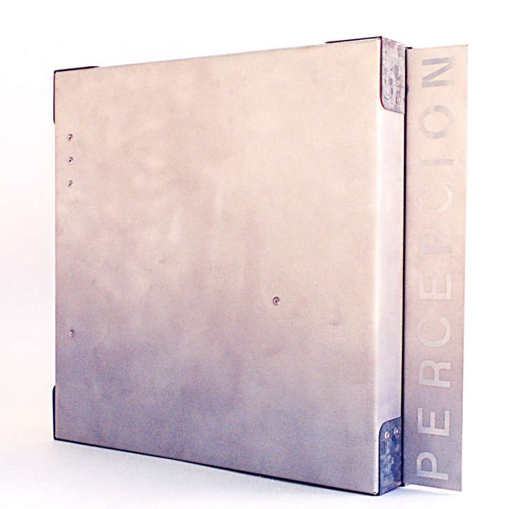 Huellas de la Percepción © 1997.  Aluminio, papel hecho a mano, cera 40 x 40 x 8 cm